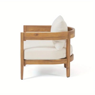 Club chair with two plush seat cushions upholstered in water-resistant polyester fabric in a light neutral tone